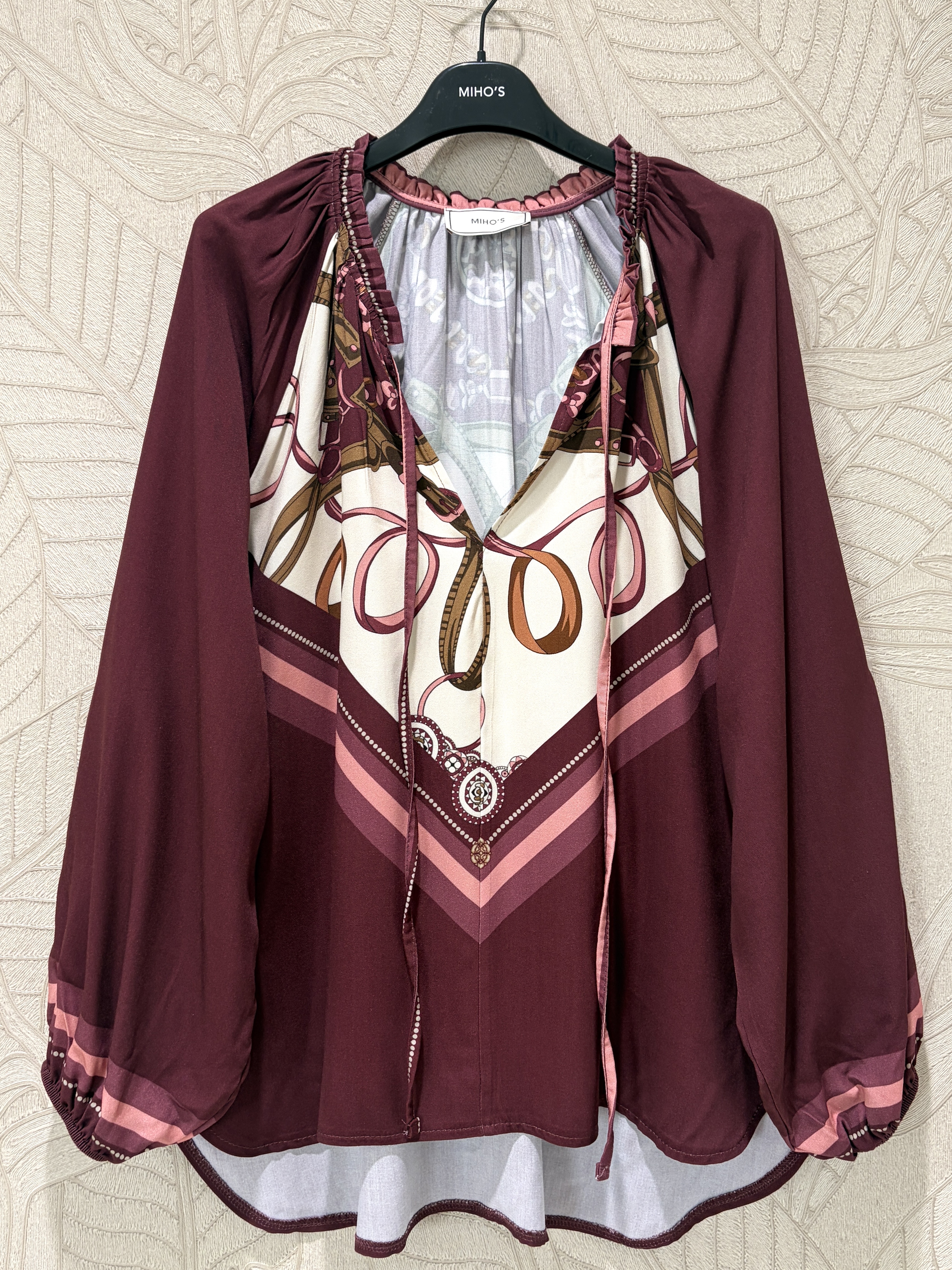Lockere Bluse mit Kordeln