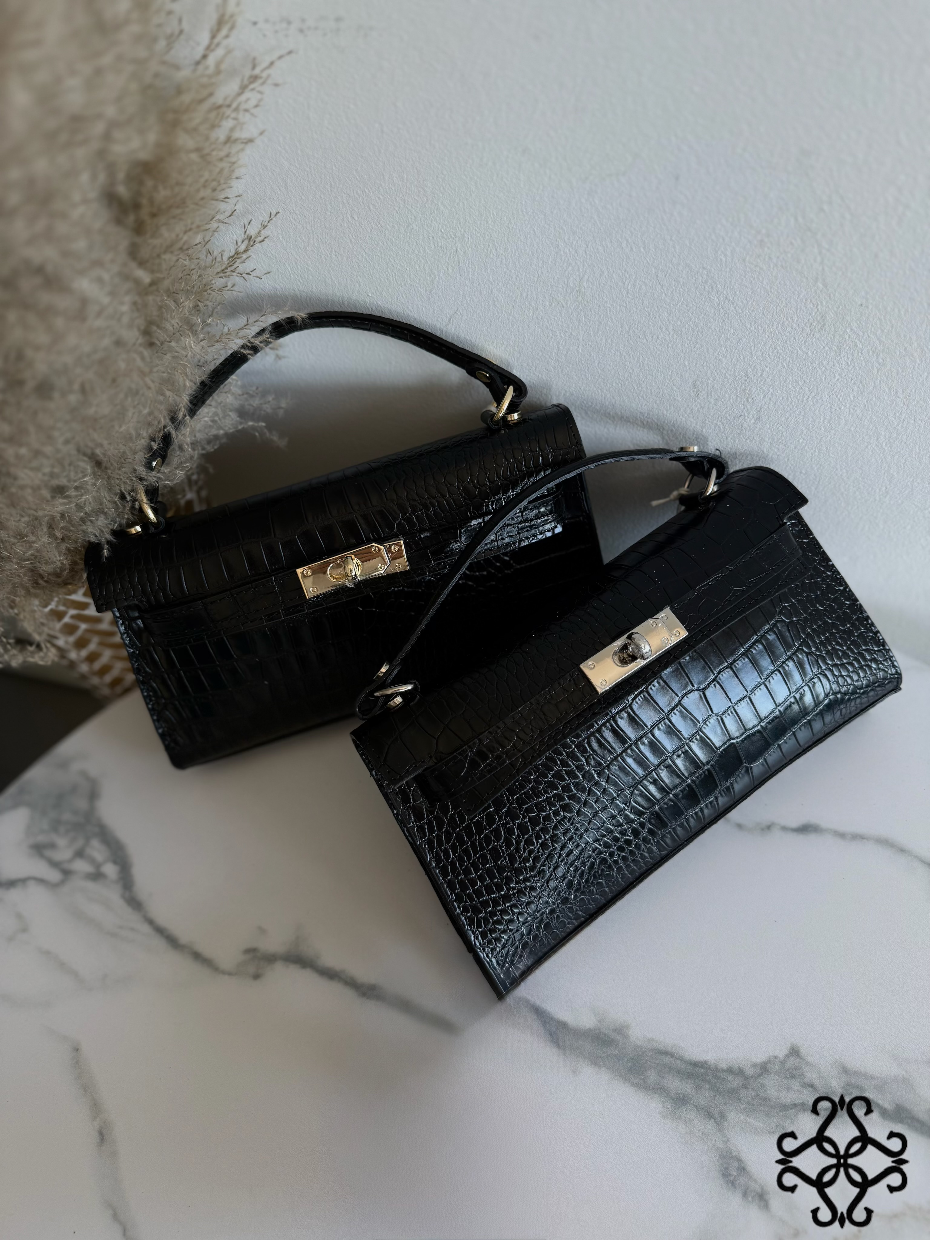 Geprägte Lederhandtasche