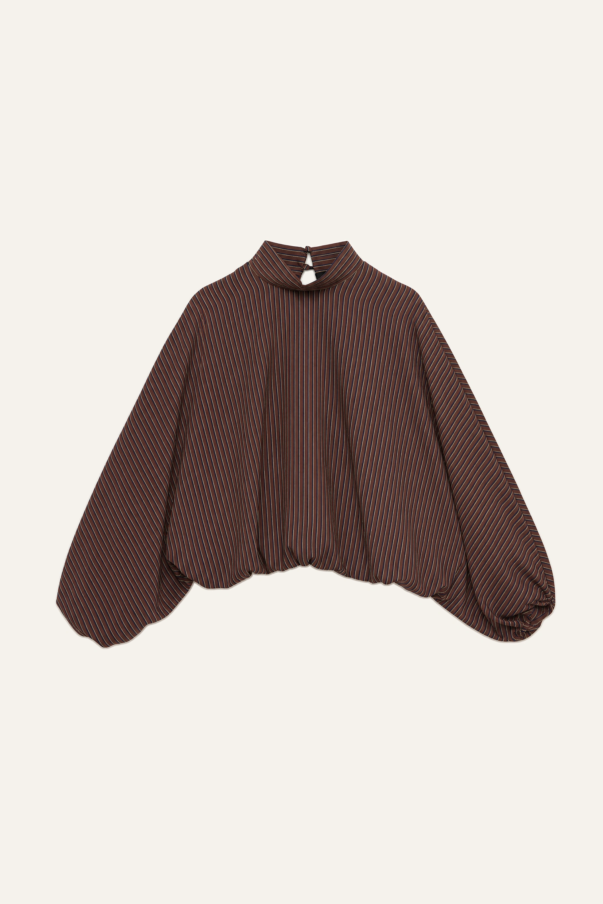 Bluse mit halbem Rollkragen und Ballonärmeln