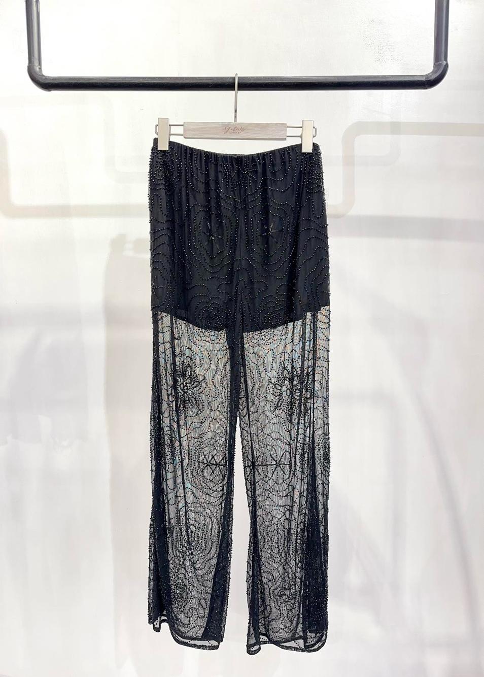 Weite Hose mit Paillettenbesatz